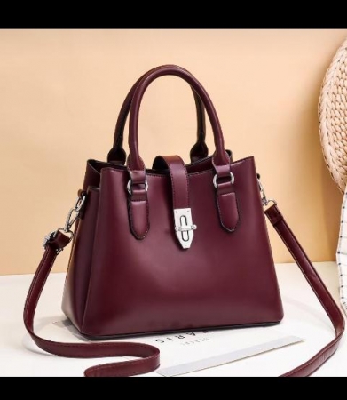 Small Maroon leather handbag with an adjustable strap